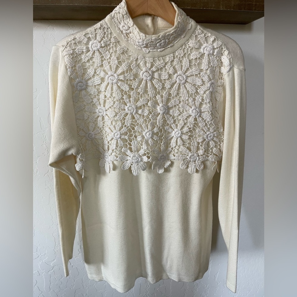 Wool blend women’s ivory/cream sweater with Crotchet Floral Details•••Mock neck